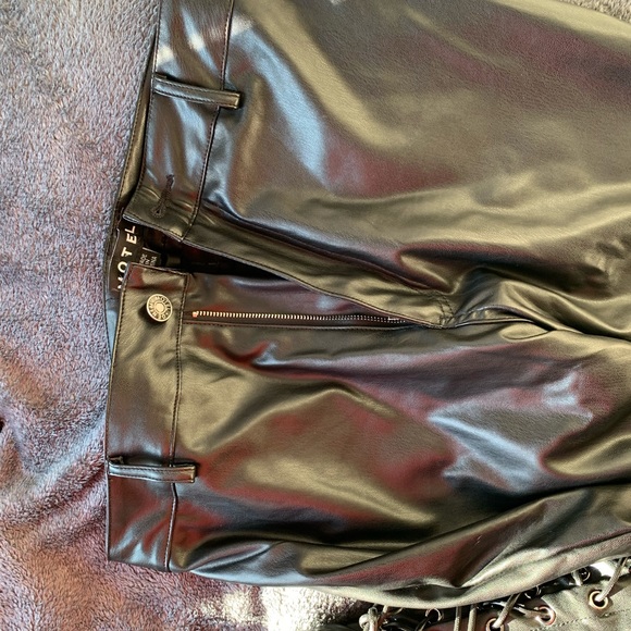 Motel Rocks Denim - Zoley Flare Trouser in PU Black from Motel Rocks. Only worn these once